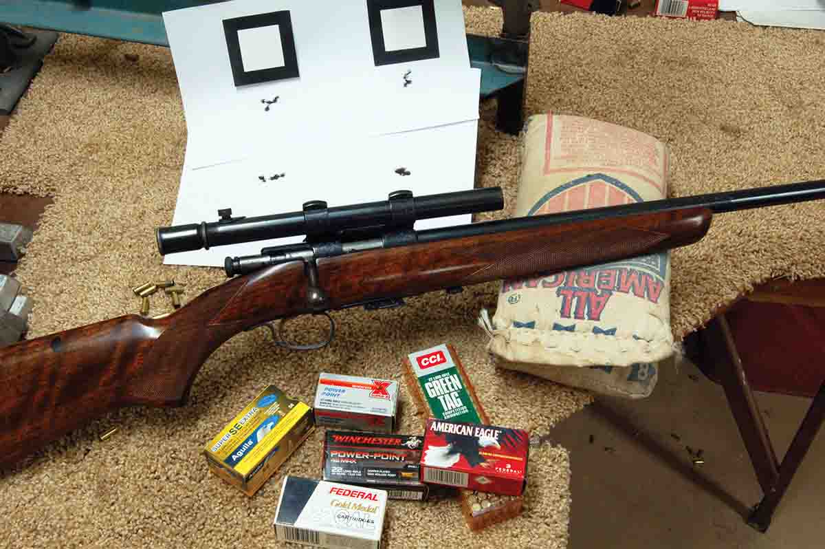 This fancied-up Winchester M69 provided good accuracy as seen by these 50-yard groups.'